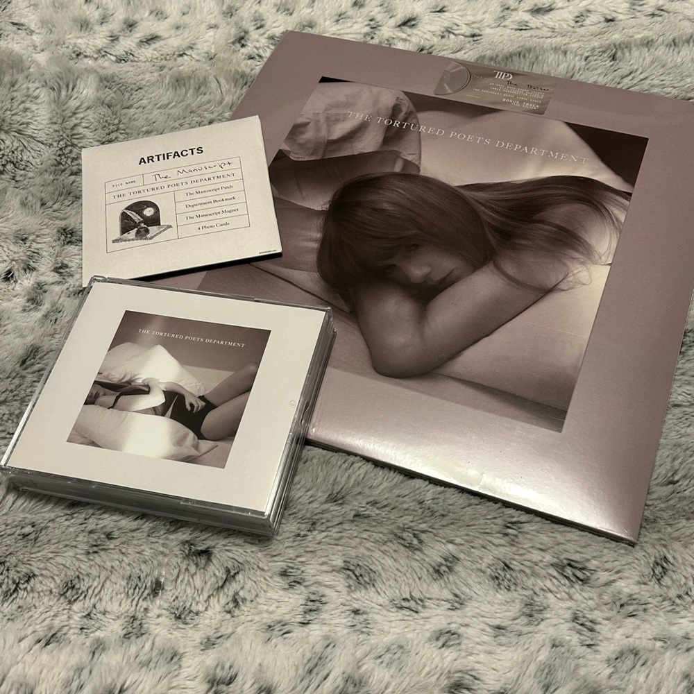 Taylor Swift The Bolter vinyl and the manuscript collectors addition cd set.